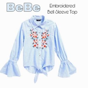 NWT BEBE Embroidered bell sleeves top ties in front. Trendy!!